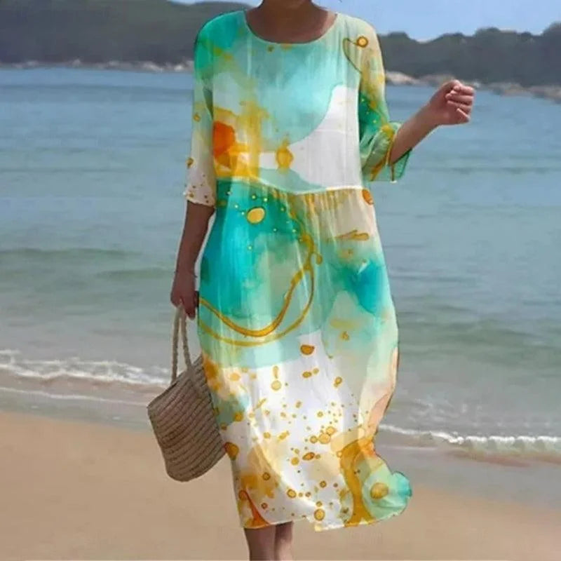 Green floral print midi beach dress featuring a relaxed fit, lightweight fabric, and flowy silhouette perfect for sunny days…