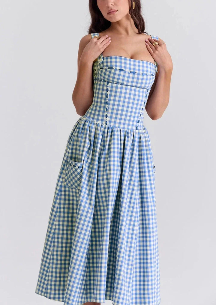 Blue gingham off-shoulder mid-length dress made of Georgette fabric, perfect for a chic and casual look.