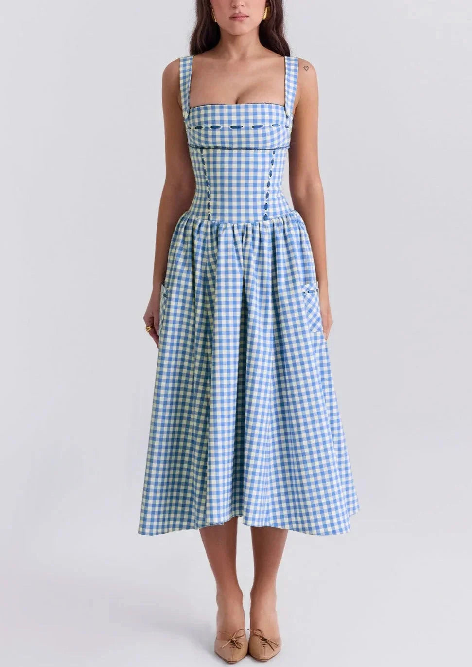Off-shoulder mid-length dress in blue gingham pattern. Made of breezy Georgette fabric perfect for summer days.