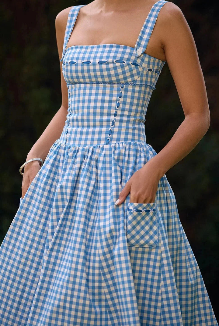 Women's blue gingham off-shoulder mid-length dress in Georgette fabric with a stylish design perfect for casual or…