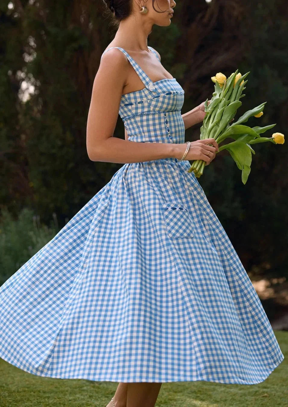 Blue gingham off-shoulder mid-length dress for women made of georgette fabric with a stylish design and trendy off-shoulder…