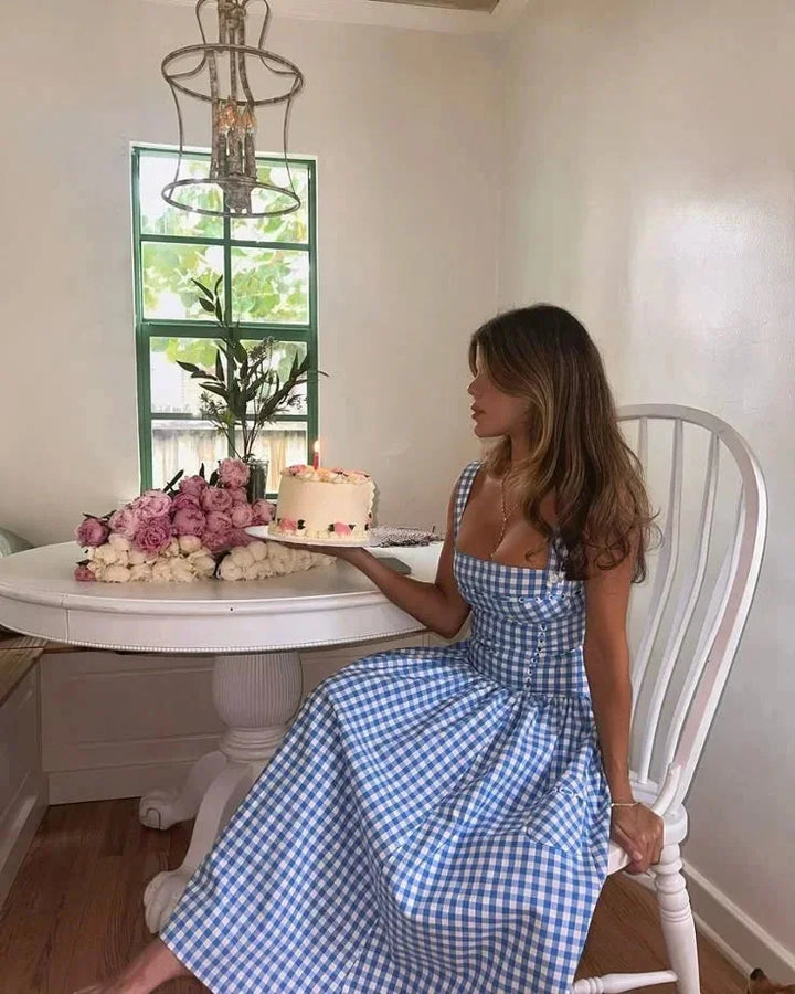 Blue gingham off-shoulder mid-length dress for women, made of Georgette fabric, perfect for casual and chic summer outfits.