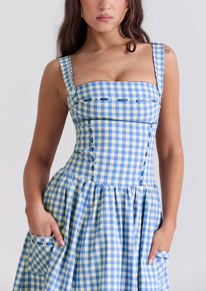 Women's blue gingham off-shoulder dress in mid-length made of georgette fabric with trendy design.
