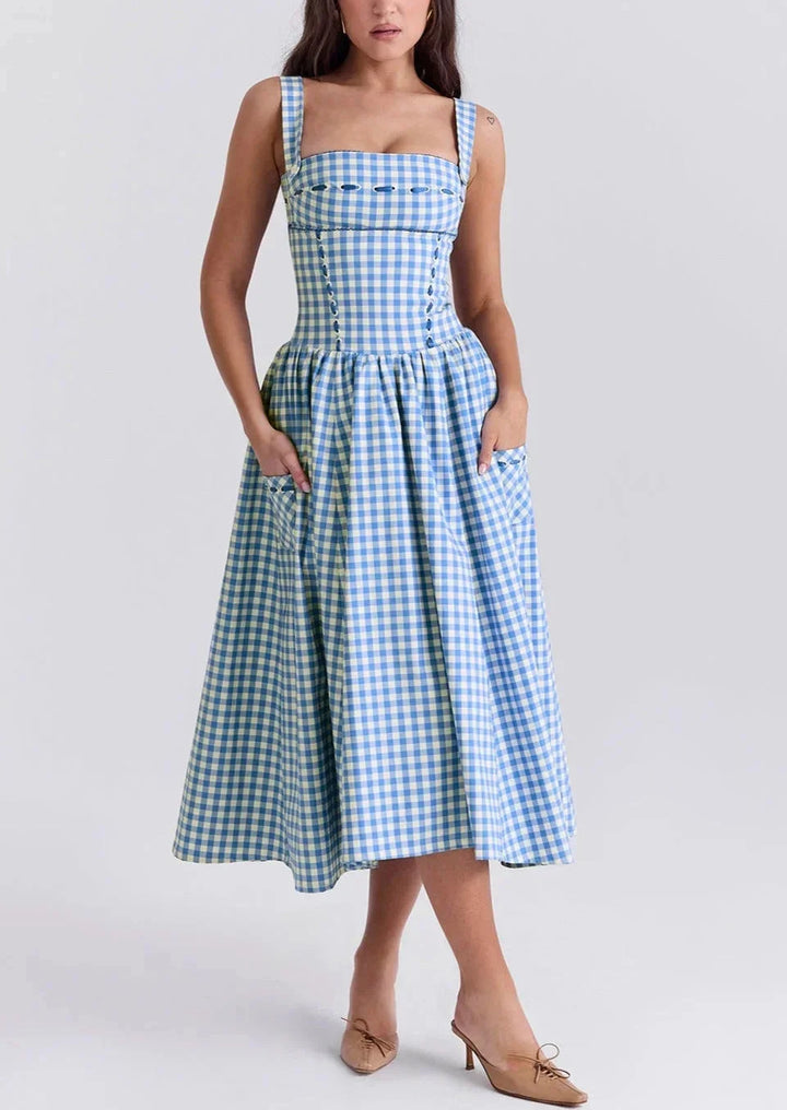 Women's blue gingham off-shoulder mid-length dress made of georgette fabric, featuring a flattering off-shoulder design.