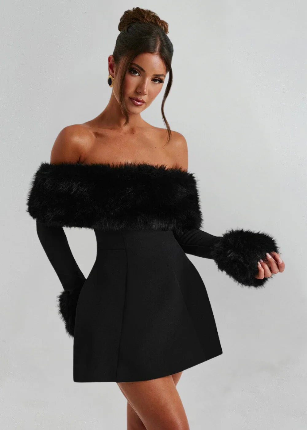 Black mini dress with fur details; soft and lightweight material, elegant design, perfect for a night out or special…