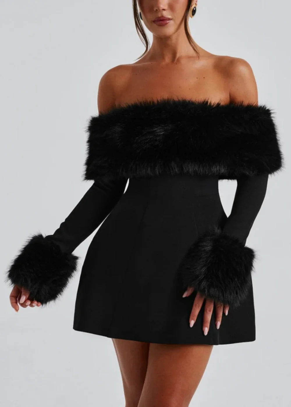 Black mini dress with fur details - Featuring a sleek design with faux fur accents, perfect for a chic and cozy style…