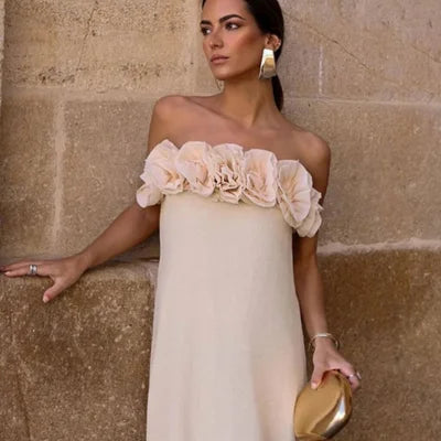 Cream off-shoulder dress in Sand with floral accents, made of cotton blend fabric, perfect for a casual yet stylish look.