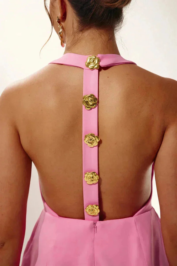 "Women's halter dress with golden buttons, made from soft cotton fabric, perfect for a casual yet stylish look."