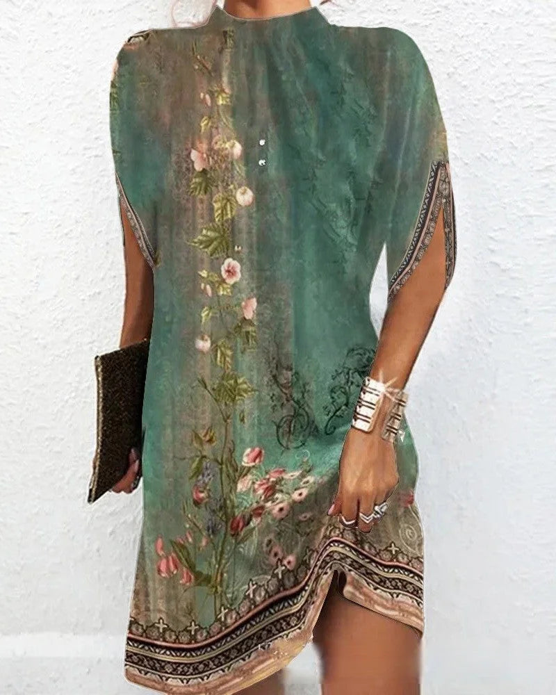 Seagreen mini dress with batwing sleeves, soft fabric, and relaxed fit.