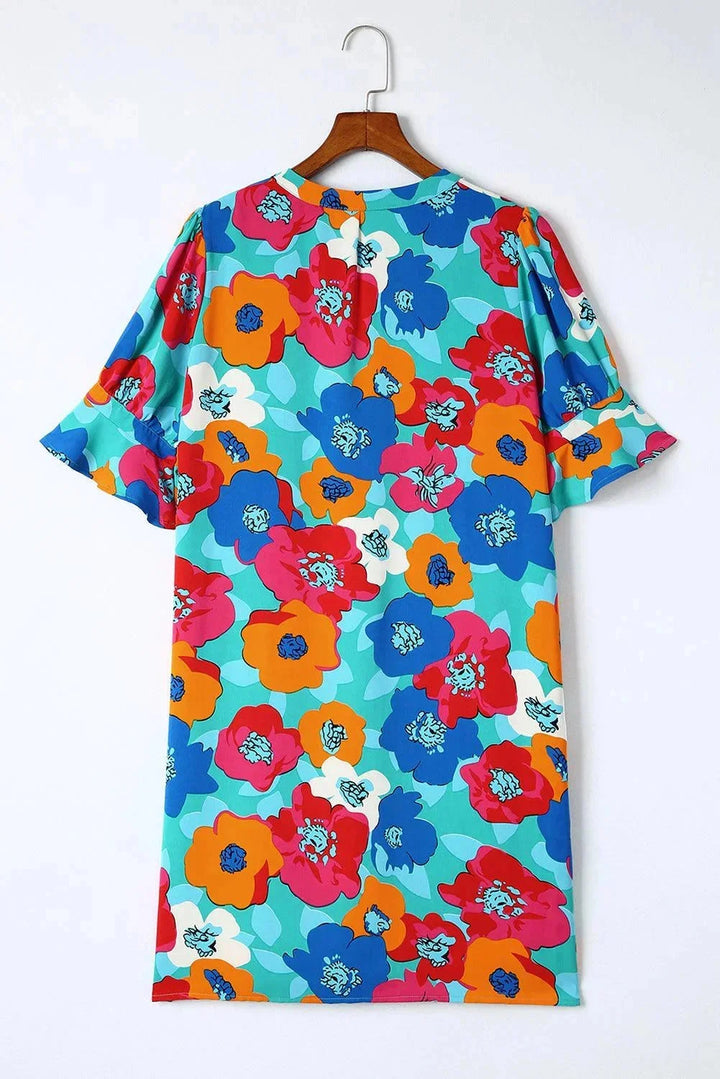 Ila light V-neck dress with breezy sleeves in soft cotton blend, perfect for summer outings and casual gatherings.
