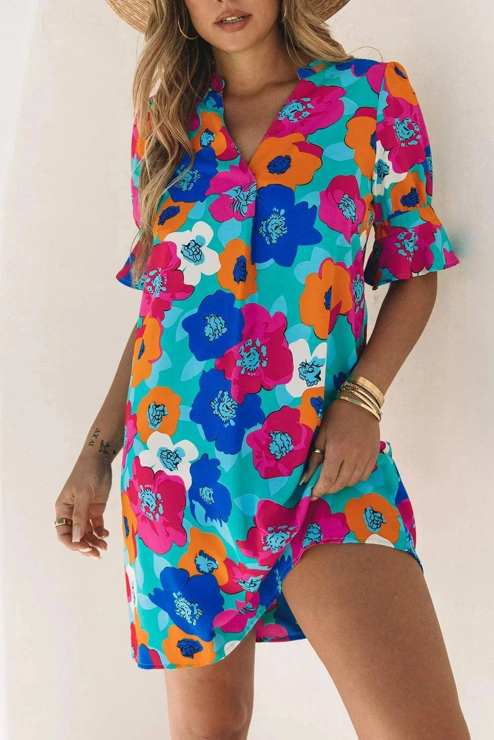 Light and airy V-neck dress with breezy sleeves by Ila, perfect for summer days.