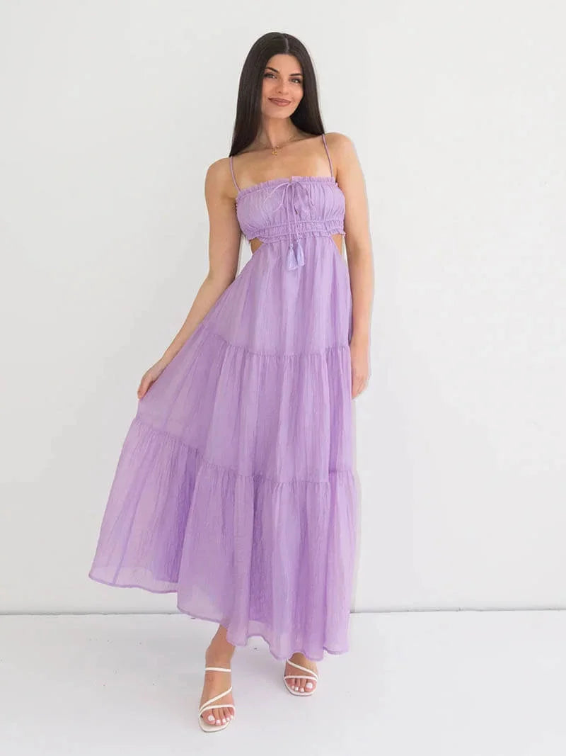 Purple spaghetti strap maxi dress for women, with adjustable straps. Made of lightweight and breathable fabric, perfect for…