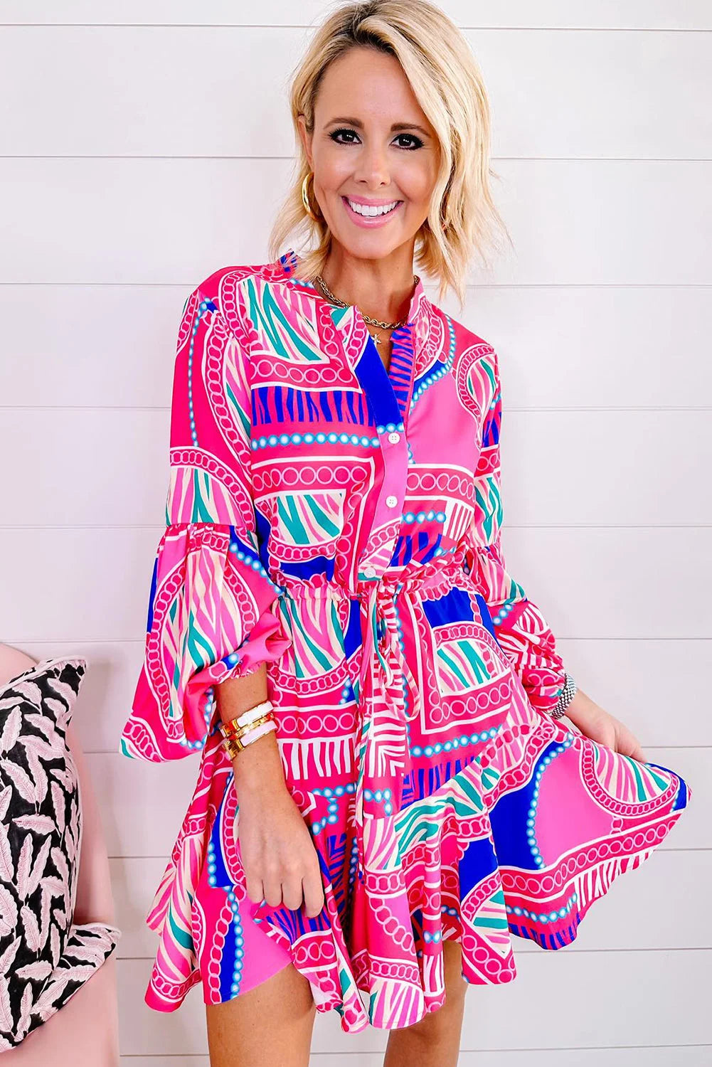 Pink tribal print dress with drawstring waist, perfect for casual outings. Made with lightweight and comfortable material…