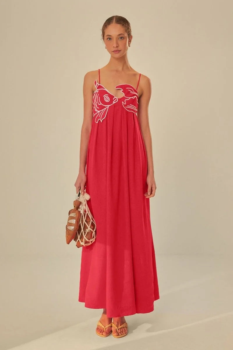 Red cotton maxi dress featuring goldfish embroidery, perfect for a casual yet chic look.