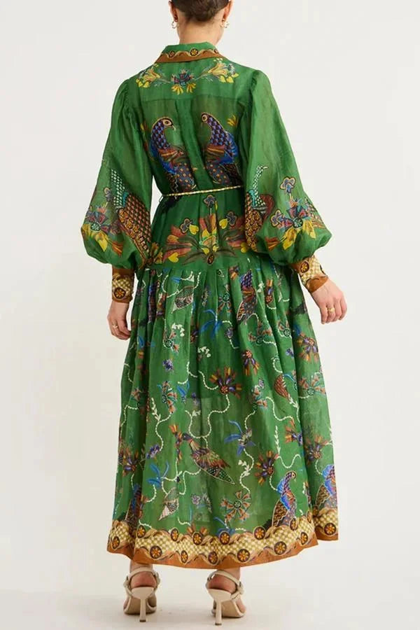 "Green bird print button-up midi dress for women, featuring whimsical avian design on lightweight fabric."