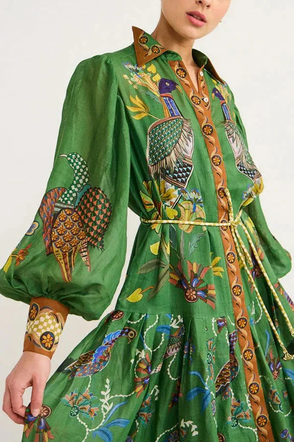 Women's green bird print button-up midi dress featuring a whimsical bird pattern on a comfortable and breathable fabric.
