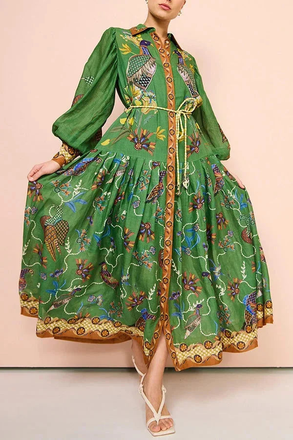 "Green bird print midi dress for women, featuring a stylish button-up design. Made from lightweight, breathable fabric."