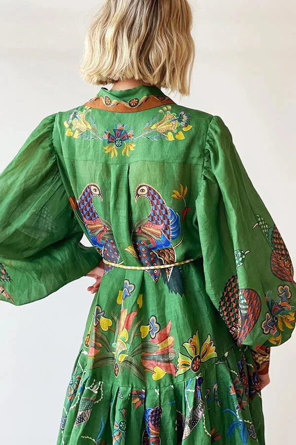 Green bird print button-up midi dress for women by Janessa. Features a charming print design that is perfect for casual…
