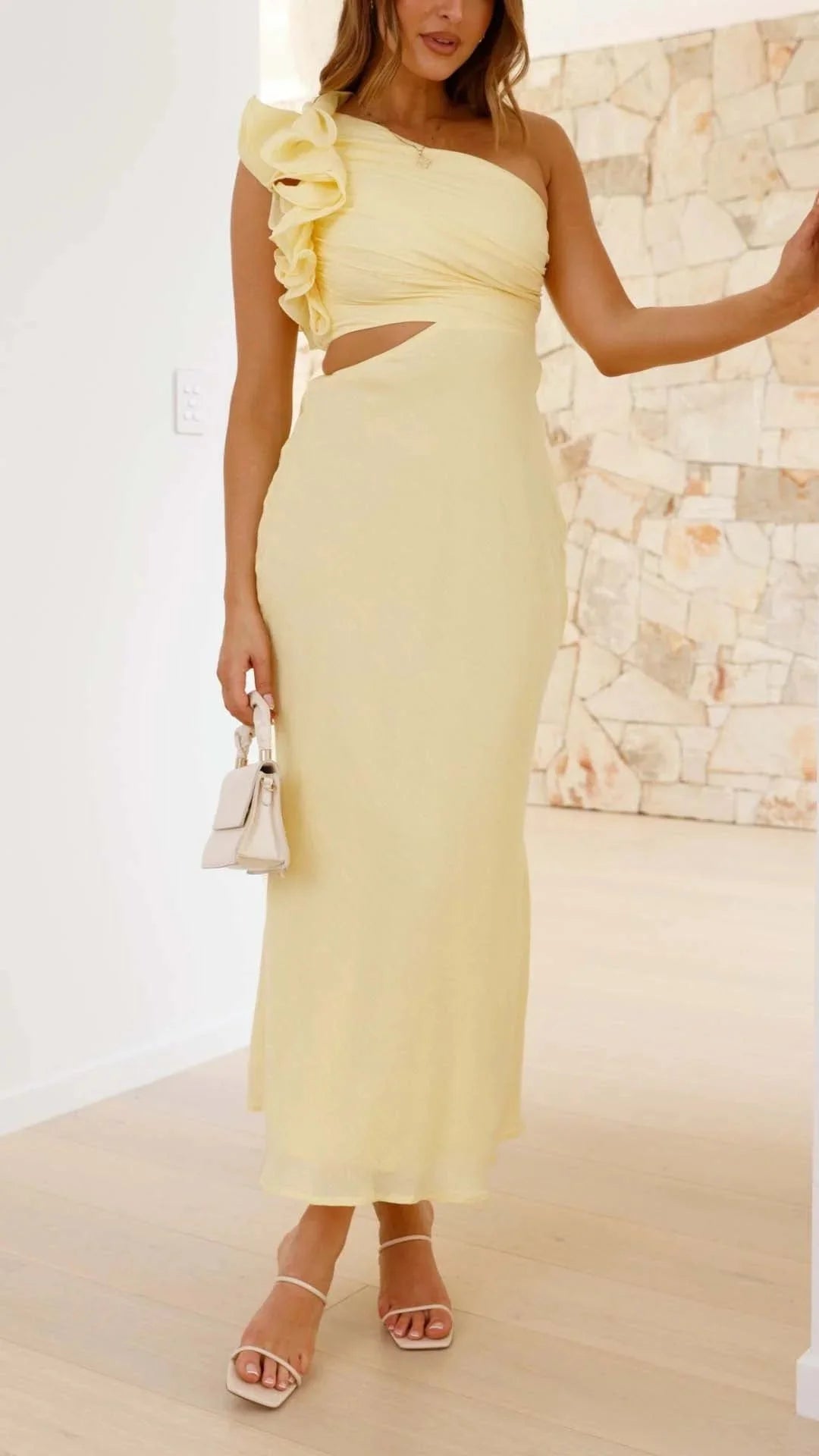 Yellow maxi dress with floral shoulder design for women by Javeah. Features a soft and breathable fabric perfect for spring…