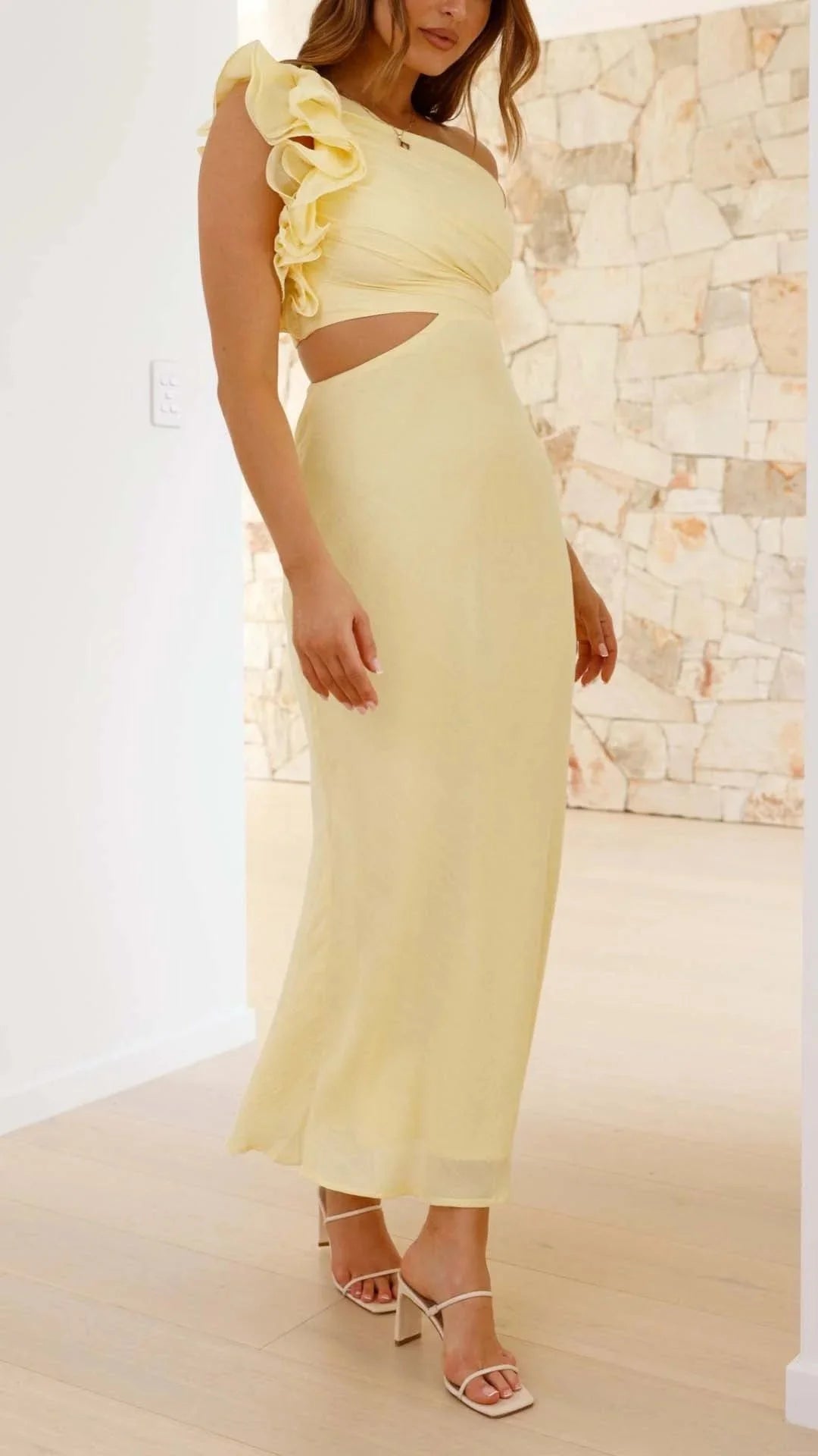 Yellow maxi dress with floral shoulder design for women, made of lightweight fabric for summer comfort and stylish casual…