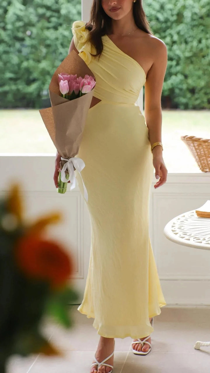 "Yellow maxi dress with floral shoulder design for women, made from lightweight and flowy fabric."