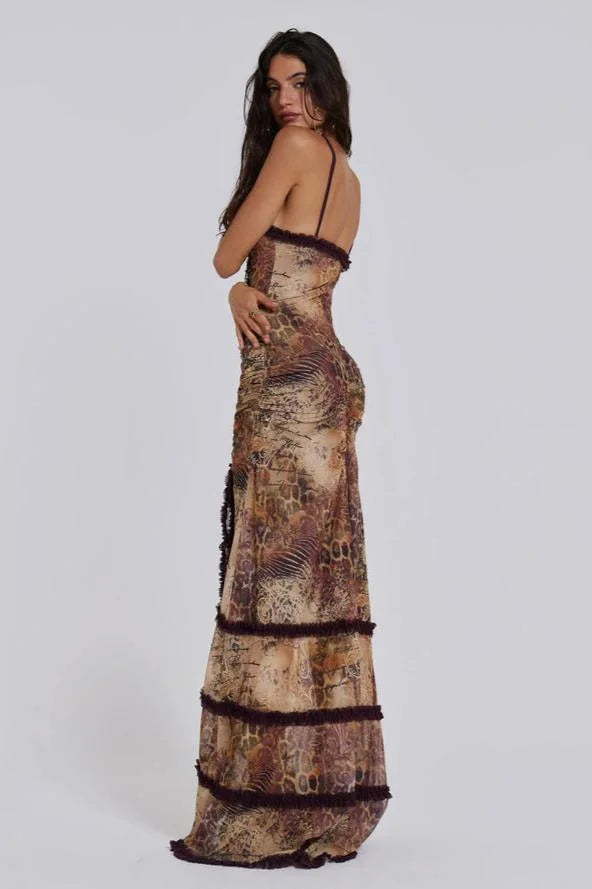 "Black floral print maxi dress with plunging neckline and artistic design, perfect for special occasions."