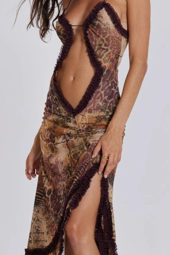 "Jazlyn plunging bust-line maxi dress with artistic patterns, made from lightweight, flowing fabric."