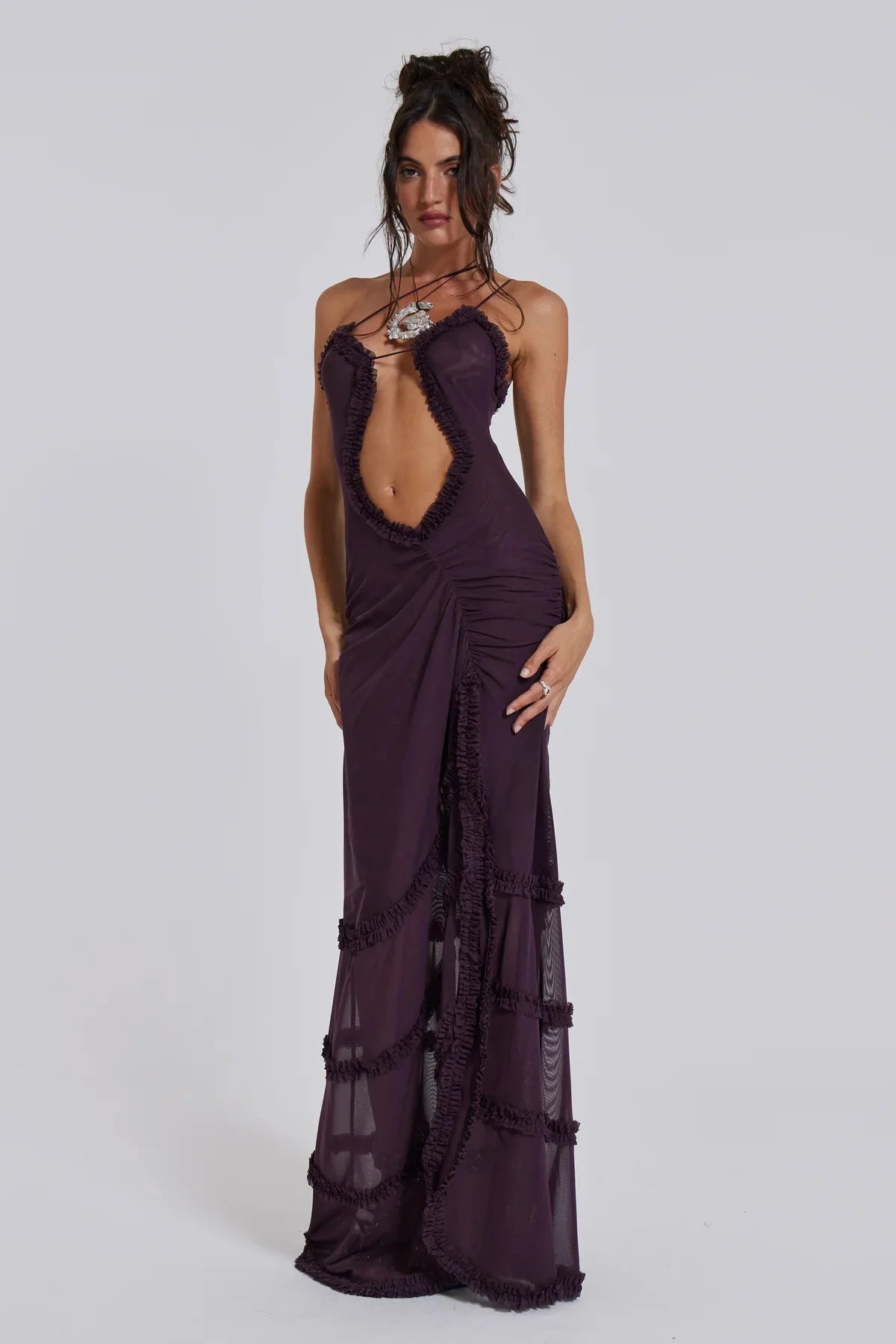 "Jazlyn maxi dress featuring a plunging bust-line, artistic design, and flowy silhouette perfect for any casual or formal…