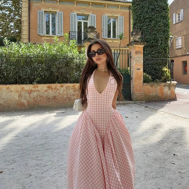 Sleeveless pink plaid midi dress with pockets, made from comfortable cotton blend fabric, perfect for casual outings or…