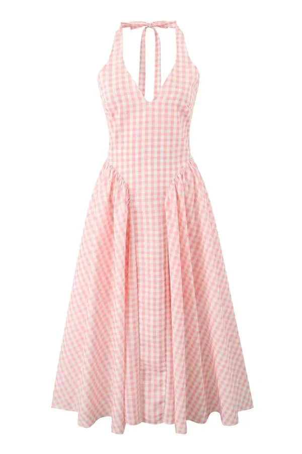 Sleeveless pink plaid midi dress with pockets, perfect for casual days. High-quality cotton blend with a stylish plaid…