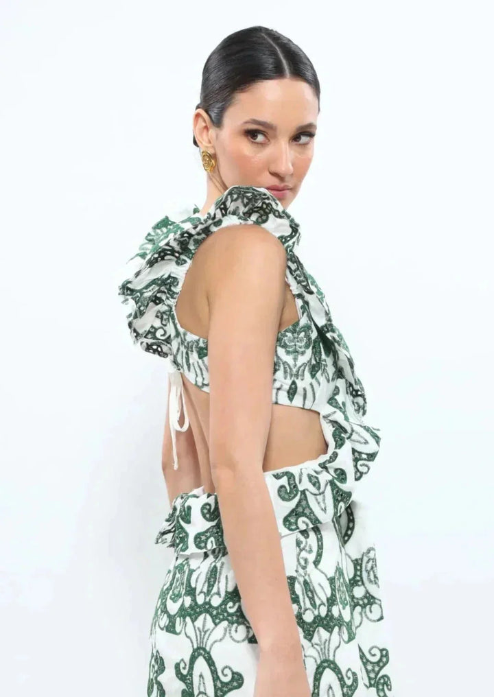 White and green ruffled maxi dress made of lightweight linen blend fabric with a flattering design for a chic summer…