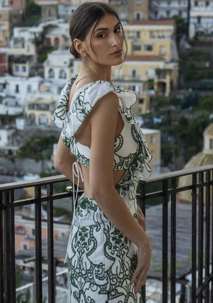 White and green ruffled maxi dress, featuring a fresh summery design perfect for outdoor events.