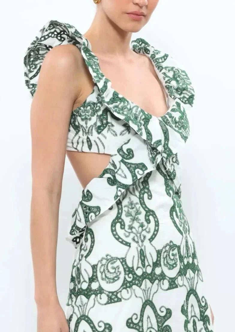 White and green ruffled maxi dress with a unique design perfect for any occasion.