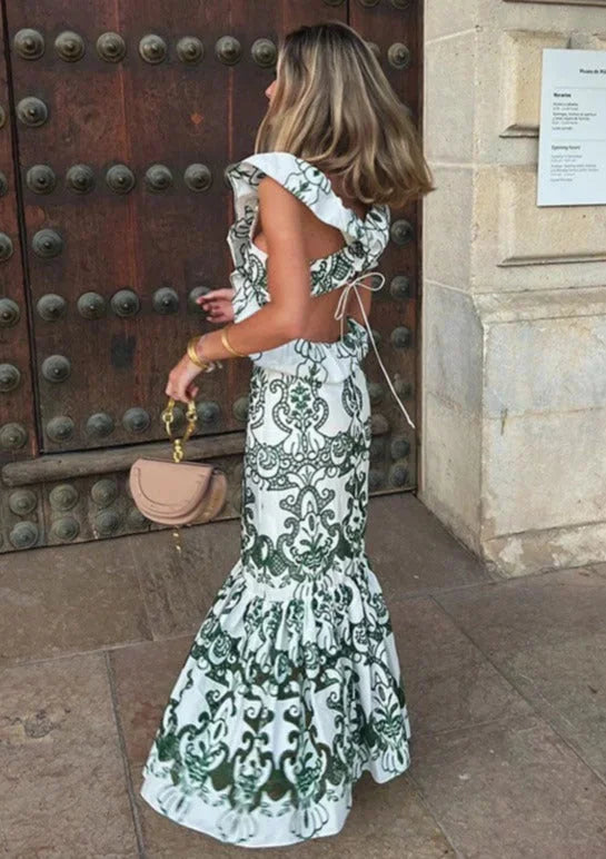 Ruffled maxi dress in white green, featuring a flowing design with delicate ruffles and a refreshing color combination.
