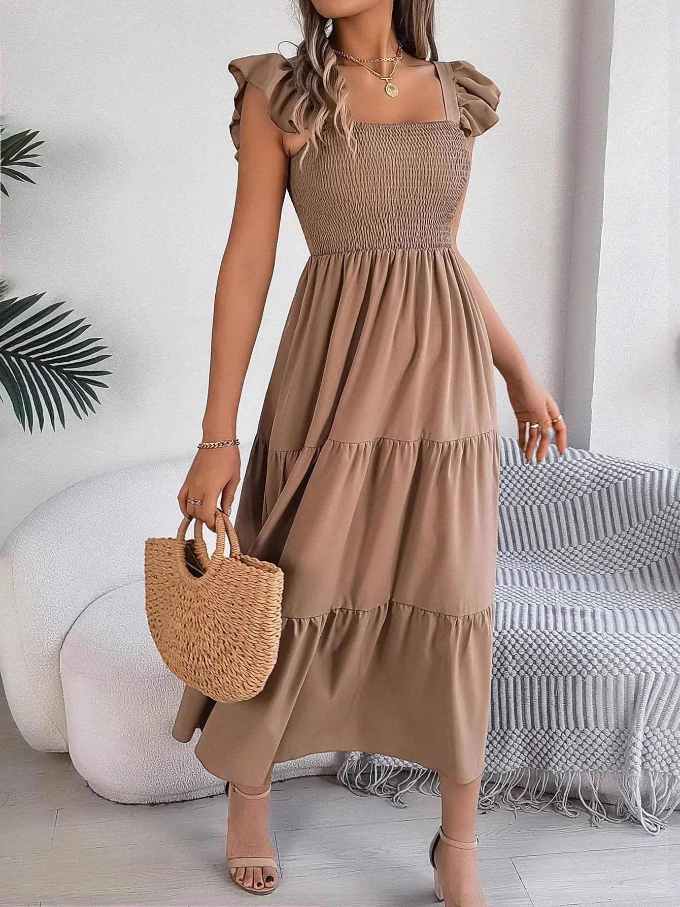 Khaki tiered ruffle smocked midi dress with a relaxed fit and soft fabric ideal for everyday wear.