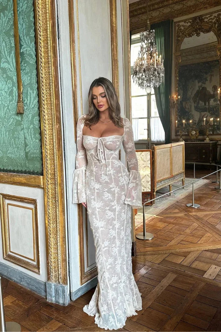 "Women's white lace off-shoulder dress with long sleeves, elegant design."