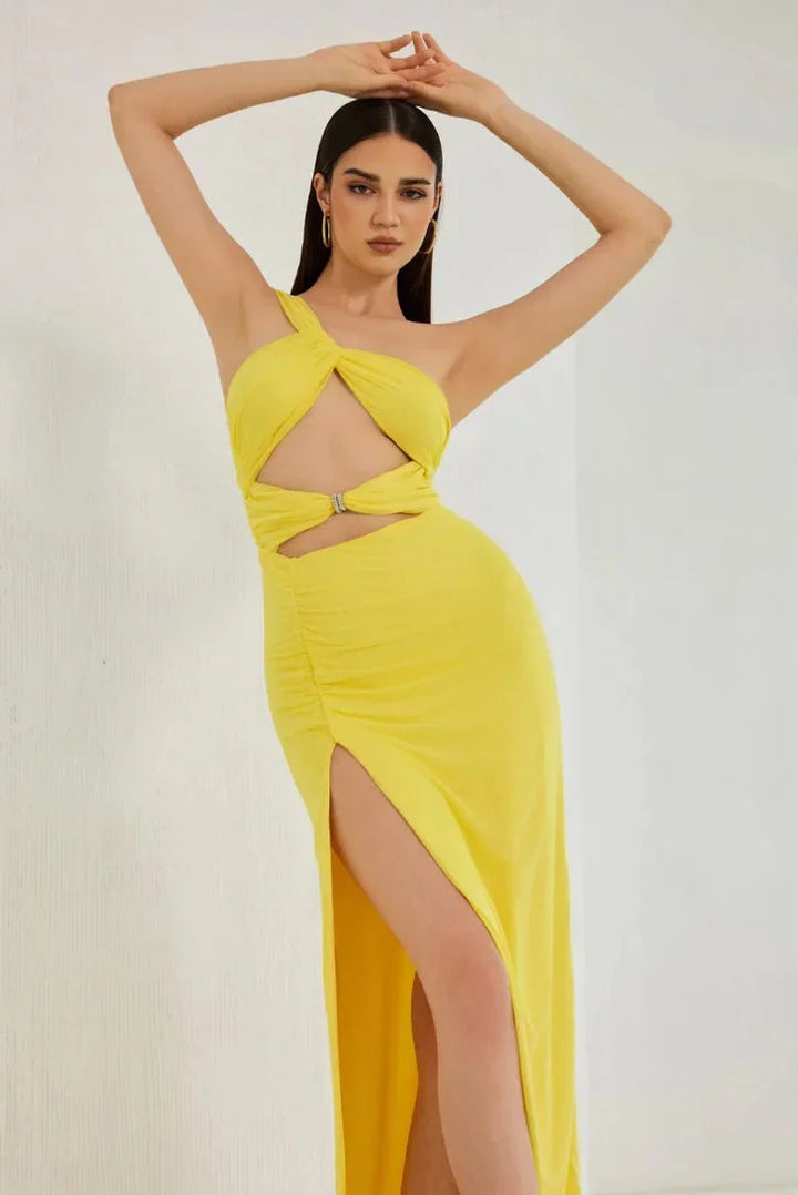 "Yellow sleeveless maxi dress with high slit for women, made from lightweight flowy fabric, perfect for a relaxed yet chic…