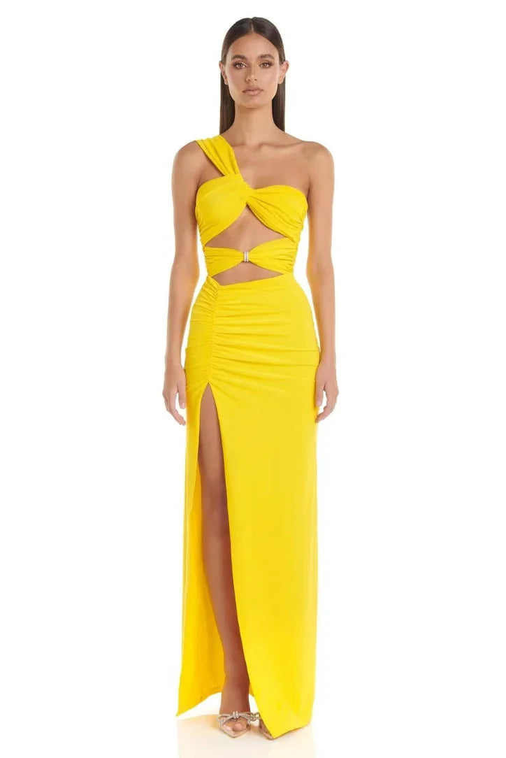 "Women's yellow maxi dress with high slit, perfect for summer. Made of flowy fabric with a flattering silhouette."