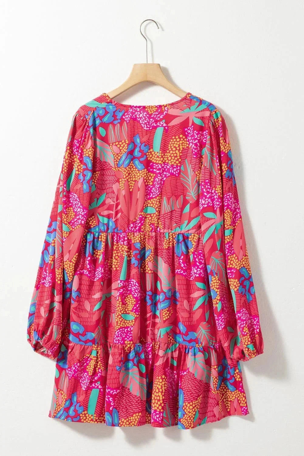 Floral bell-sleeved V-neck dress made of soft cotton blend fabric for women, perfect for a casual yet trendy outfit.