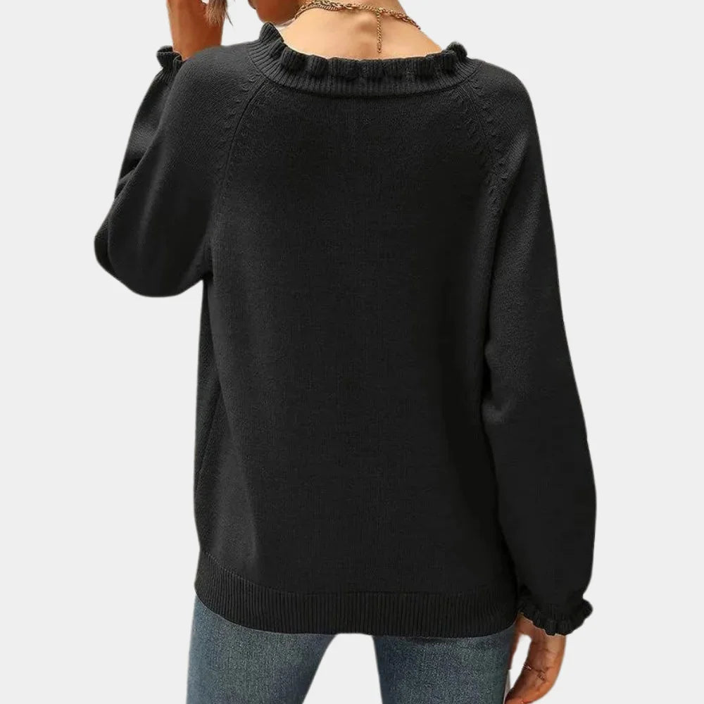 "Soft and cozy long sleeve pullover with ruffle collar for a touch of elegance."