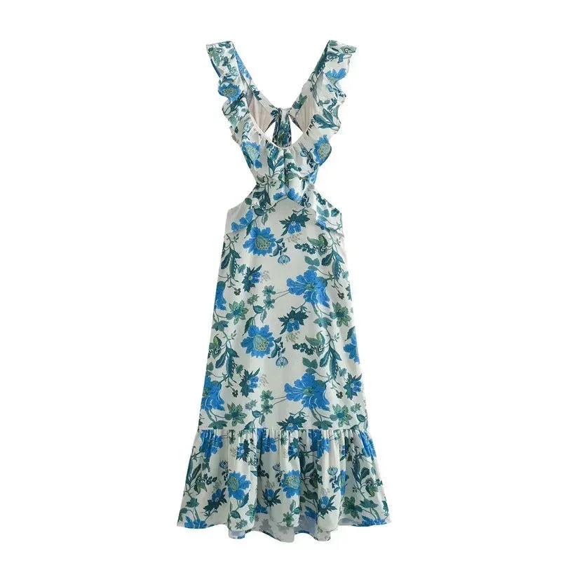 Blue midi dress with ruffles and floral pattern. Made from soft, flowy fabric. Perfect for a casual yet chic look.