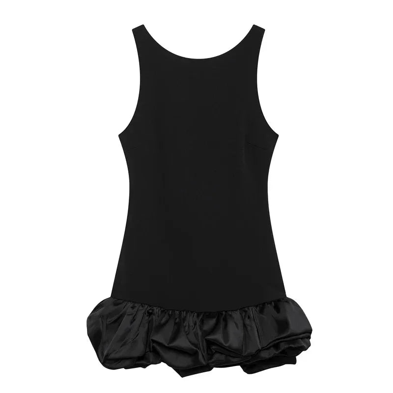 Sleeveless black dress by Keziah with elegant ruffled accents, perfect for a sophisticated yet stylish look.