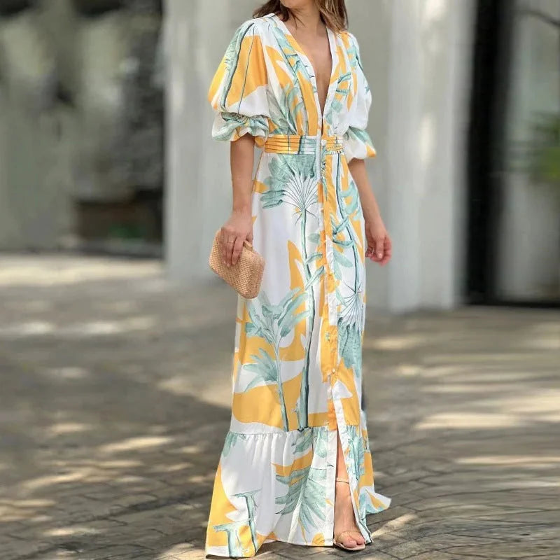 Flowy tropical maxi dress made of lightweight khadi fabric, featuring a flattering V-neck design.