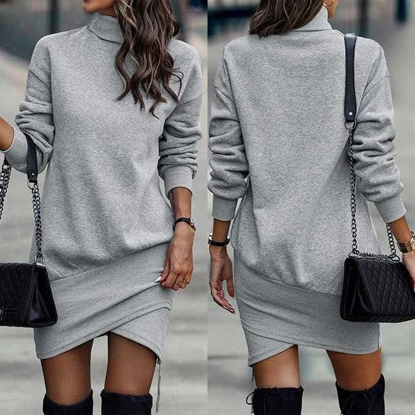 Gray turtle neck sweater dress with zip detail, made of soft knit fabric. Flattering fit and chic design for a stylish look.