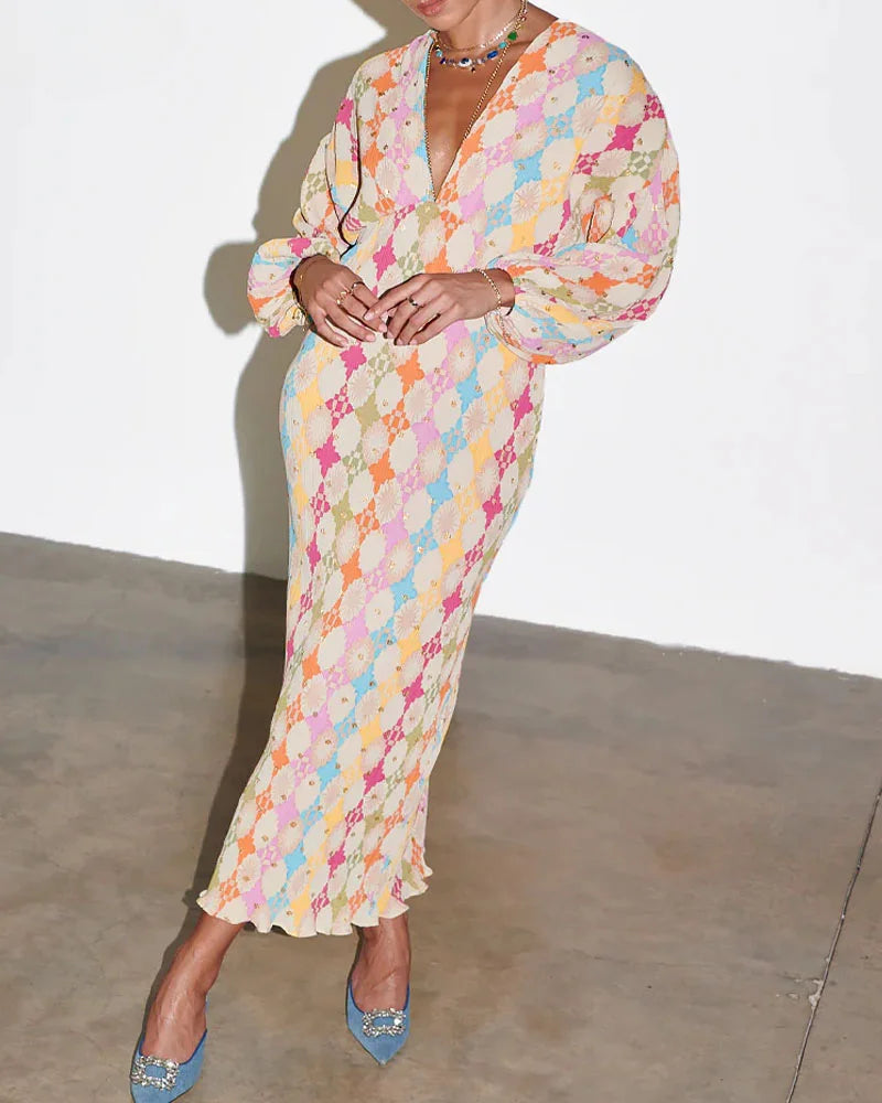 Geometric wrap maxi dress featuring pastel colors, perfect for a summer day out.