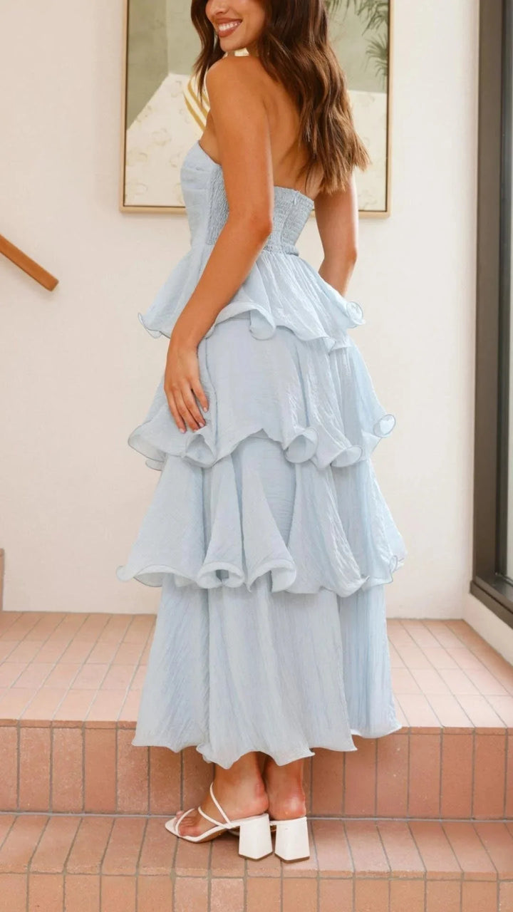 Strapless maxi dress in black with tiered ruffles, perfect for summer in lightweight cotton material.