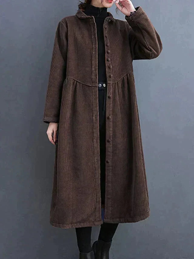 Krystal warm dress in Choco with button-front design, versatile style, and cozy fabric.