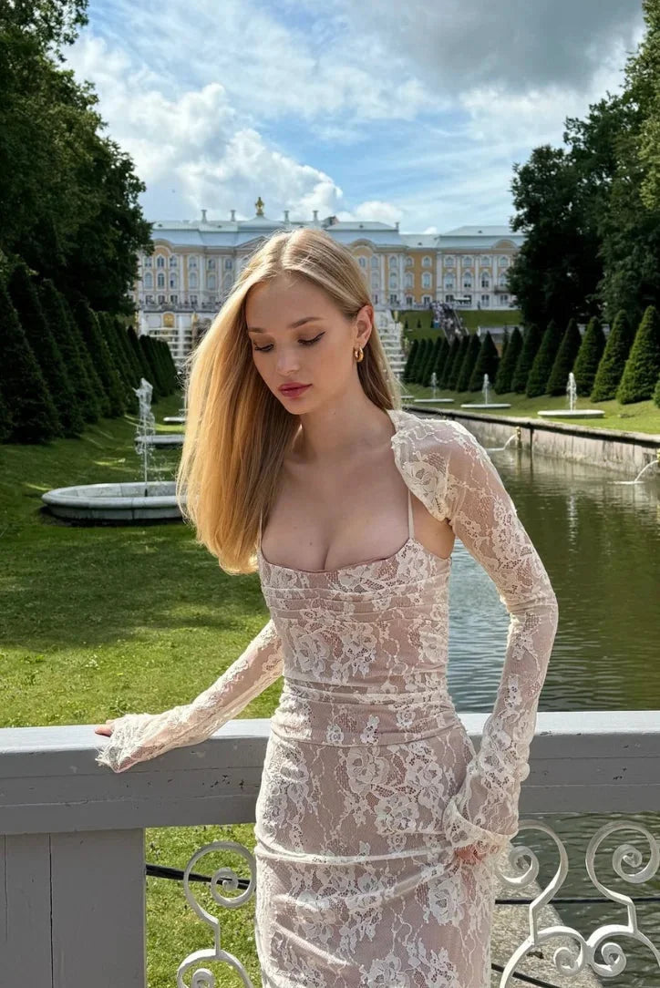 White fitted lace dress with sheer sleeves, elegant and feminine - perfect for special occasions or date nights.
