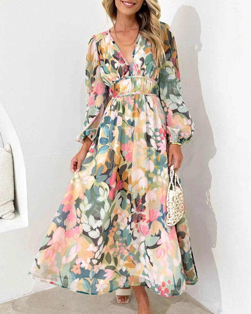 Lively floral maxi dress with a belt, featuring a flowy design and vibrant print, perfect for any casual or semi-formal…