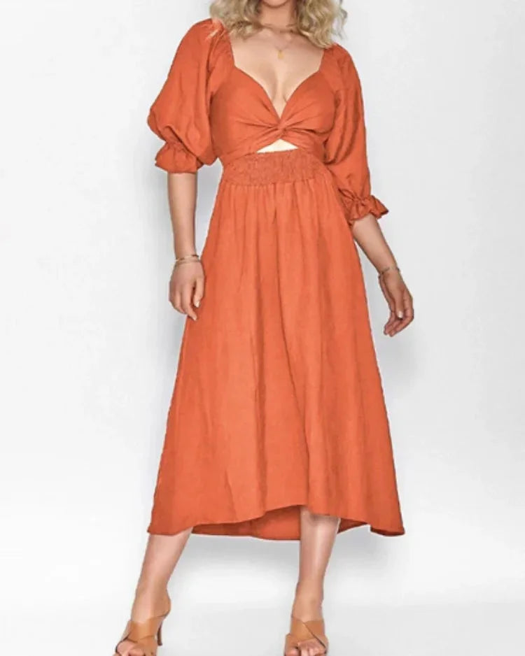 "Orange wrap dress for women with ruched sleeves, made of lightweight fabric, perfect for casual or special occasions."